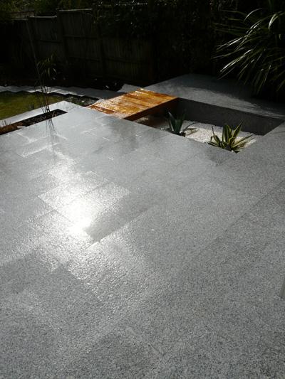Here is a great example of the Bradstone Natural Granite paving in Silver Grey, when wet.