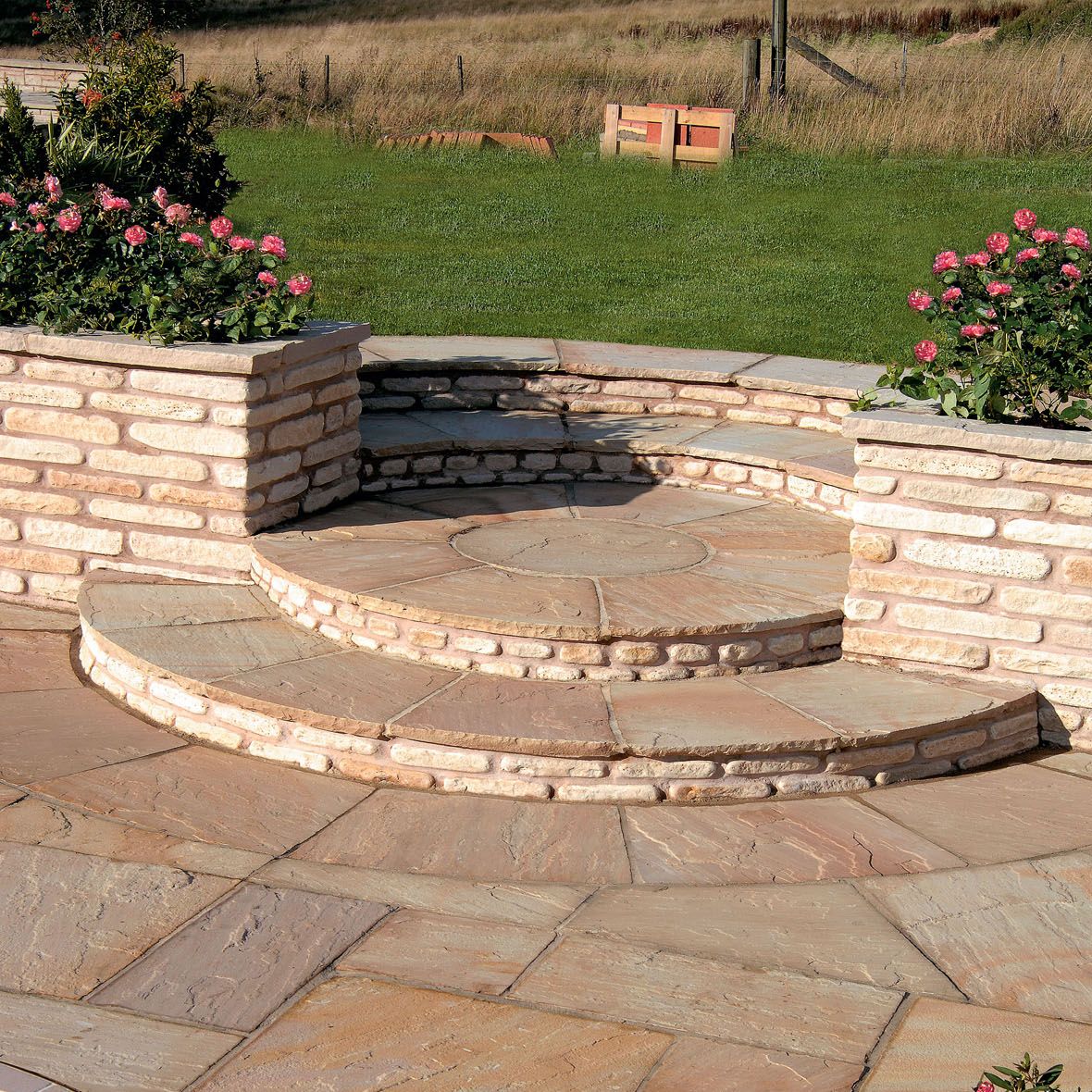 Bradstone Natural Sandstone 3 Ring Circle in Sunset Buff using Fossil Buff Walling to create a unique step feature