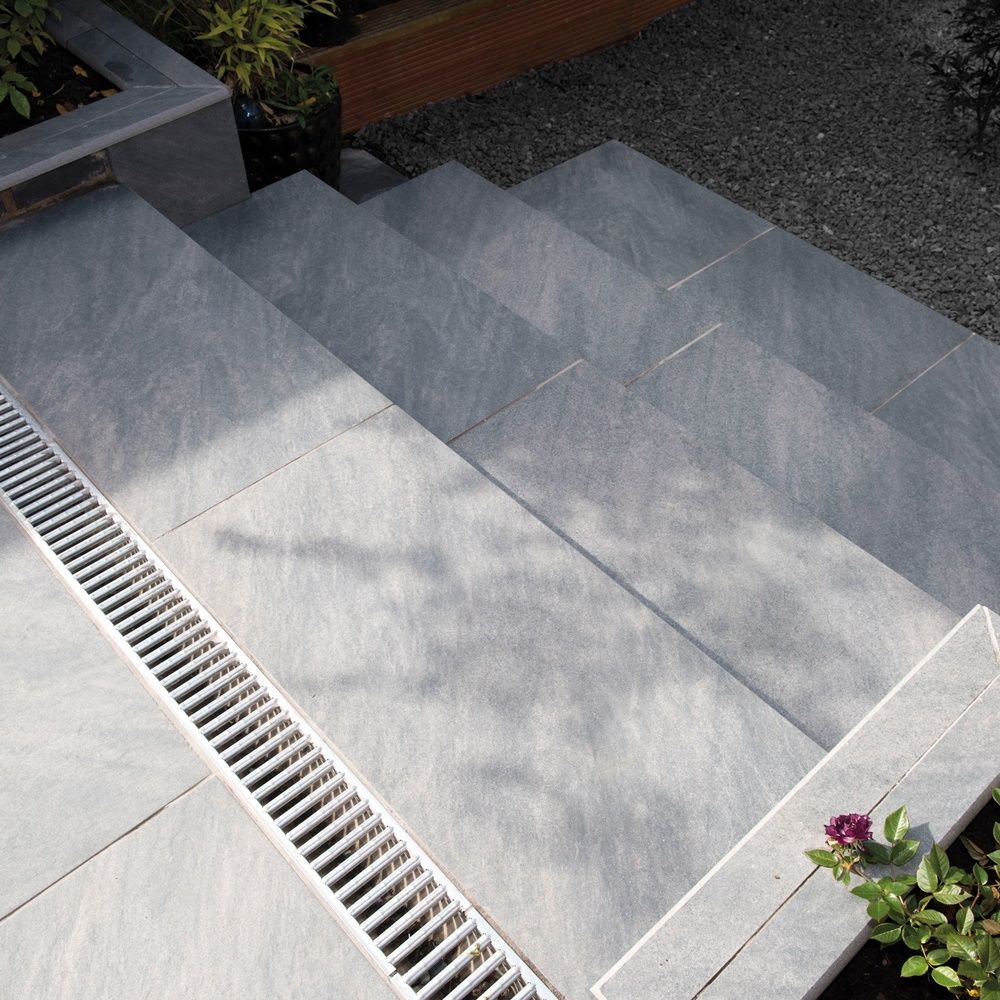 Create a modern stairway with the Bradstone Mode Step in Silver Grey is a practical and elegant way to combine two areas together.